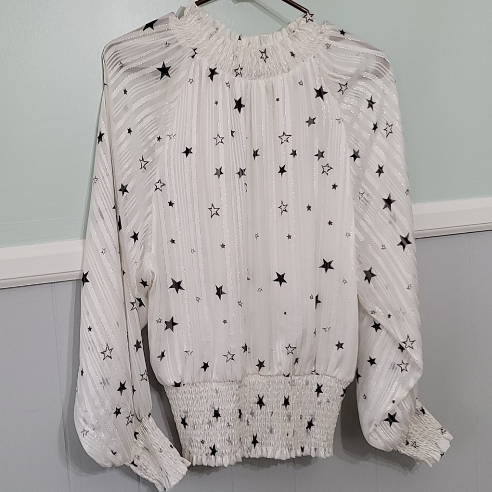 Glam white blouse with black stars